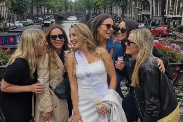 Hen party group enjoying a prosecco bike in Amsterdam